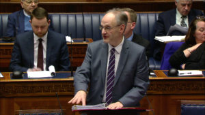 Peter Weir Education Minister answering questions in the Assembly Chamber