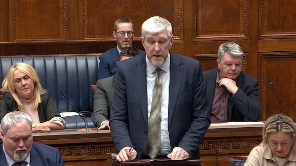 Minister for Infrastructure, John O'Dowd, delivers a statement on potholes.