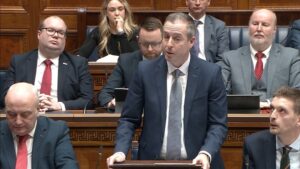 Minister of Education, Paul Given provides a statement to the Assembly.