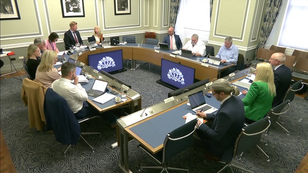 Public Accounts Committee Members sitting in a committee room at Parliament Buildings