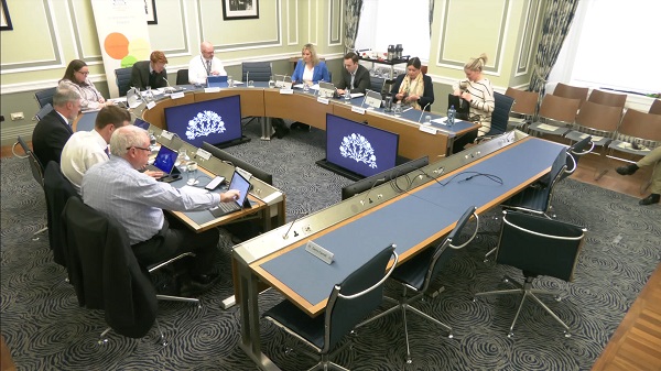 The Committee for Finance sitting in a committee room at Parliament Buildings