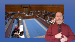 An Irish sign language interpreter translates proceedings from Question Time on April 8 2024.