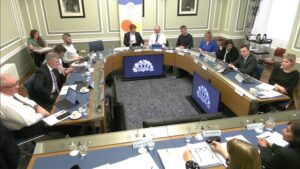 The Committee for Finance sitting in a committee room at Parliament Buildings