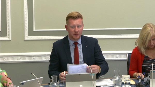 Chair of the Public Accounts Committee Daniel McCrossan sitting in a committee room at Parliament Buildings