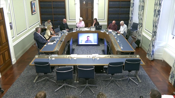 The Committee for Justice sitting in a committee room in Parliament Buildings