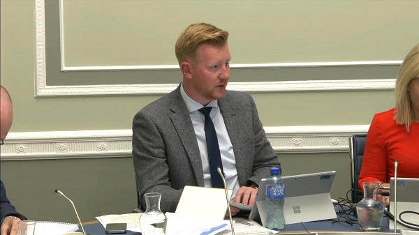 Chair of the Public Accounts Committee Daniel McCrossan sitting in a committee room at Parliament Buildings