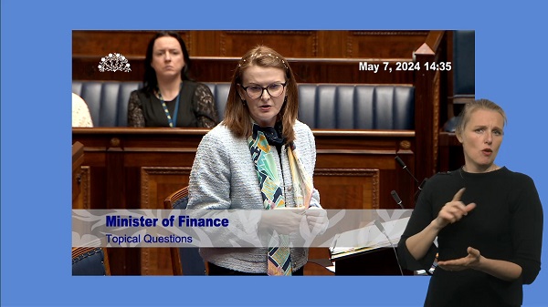 Finance Minister Caoimhe Archibald speaking in the Assembly Chamber