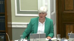 Chair of the Justice Committee Joanne Bunting sitting in a committee room at Parliament Buildings