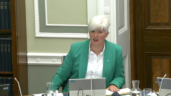 Chair of the Justice Committee Joanne Bunting sitting in a committee room at Parliament Buildings