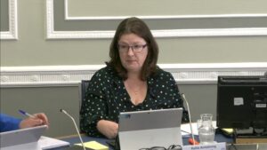 Committee Chair Kellie Armstrong sitting in a committee room in Parliament Buildings