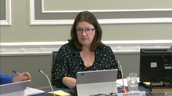 Committee Chair Kellie Armstrong sitting in a committee room in Parliament Buildings