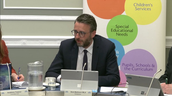 Committee Chair Nick Mathison sitting in a committee room in Parliament Buildings