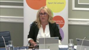 Deputy Chair of the Committee Ciara Ferguson sitting in a committee room at Parliament Buildings