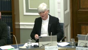 Chair of the Justice Committee Joanne Bunting sitting in a committee room at Parliament Buildings