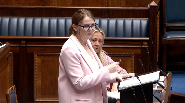 Finance Minister Caoimhe Archibald speaking in the Assembly Chamber