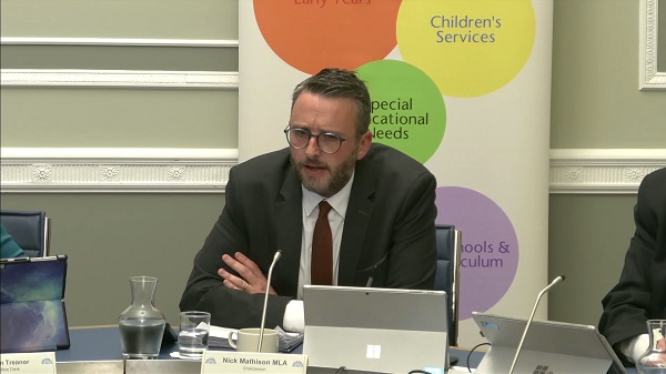 Committee Chair Nick Mathison sitting in a committee room in Parliament Buildings