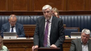 Minister John O'Dowd answering questions during Question Time on Monday 30 September 2024
