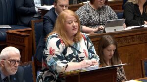 Minister of Justice, Naomi Long, answers Members questions during Question Time in the Assembly Chamber.