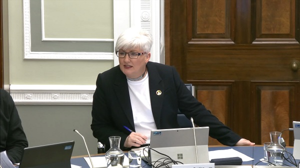 Chair of the Justice Committee Joanne Bunting sitting in a committee room at Parliament Buildings