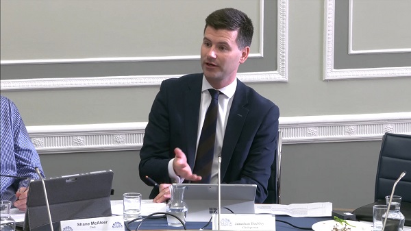 Johnathan Buckley, Chair of the Committee sitting in a committee room in Parliament Buildings