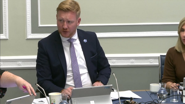 Chair of the Public Accounts Committee Daniel McCrossan sitting in a committee room at Parliament Buildings
