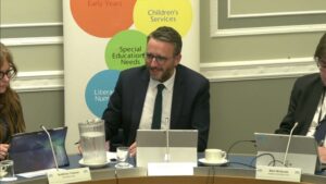 Committee Chair Nick Mathison sitting in a committee room in Parliament Buildings