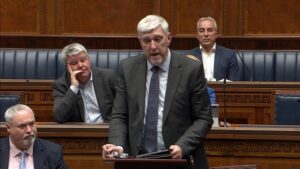 Infrastructure Minister John O'Dowd answers questions in the Assembly Chamber