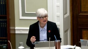 Chair of the Justice Committee Joanne Bunting sitting in a committee room at Parliament Buildings