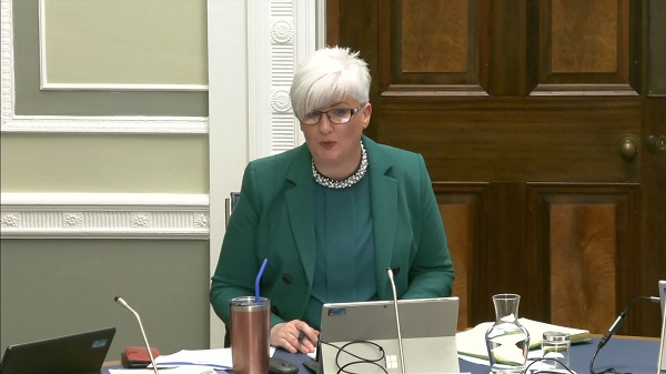 Chair of the Justice Committee Joanne Bunting sitting in a committee room at Parliament Buildings