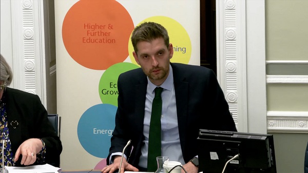Economy Committee Chairperson Phillip Brett sitting in a committee room in Parliament Buildings