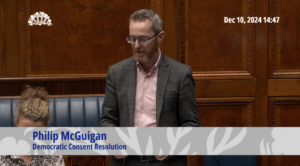 Screenshot of Philip McGuigan MLA addressing the Assembly Chamber during the debate on the Democratic Consent Resolution on Tuesday 10 December 2024.