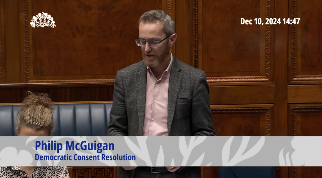 Screenshot of Philip McGuigan MLA addressing the Assembly Chamber during the debate on the Democratic Consent Resolution on Tuesday 10 December 2024.