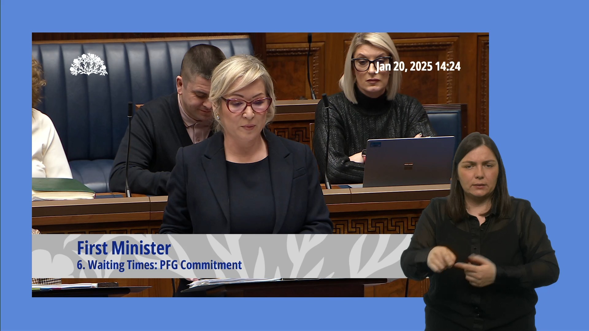 First Minister Michelle O'Neill answering questions during Question Time with the Executive Office on Monday 20th January 2025. In the foreground we see a BSL interpreter translating the First Minister's answers.